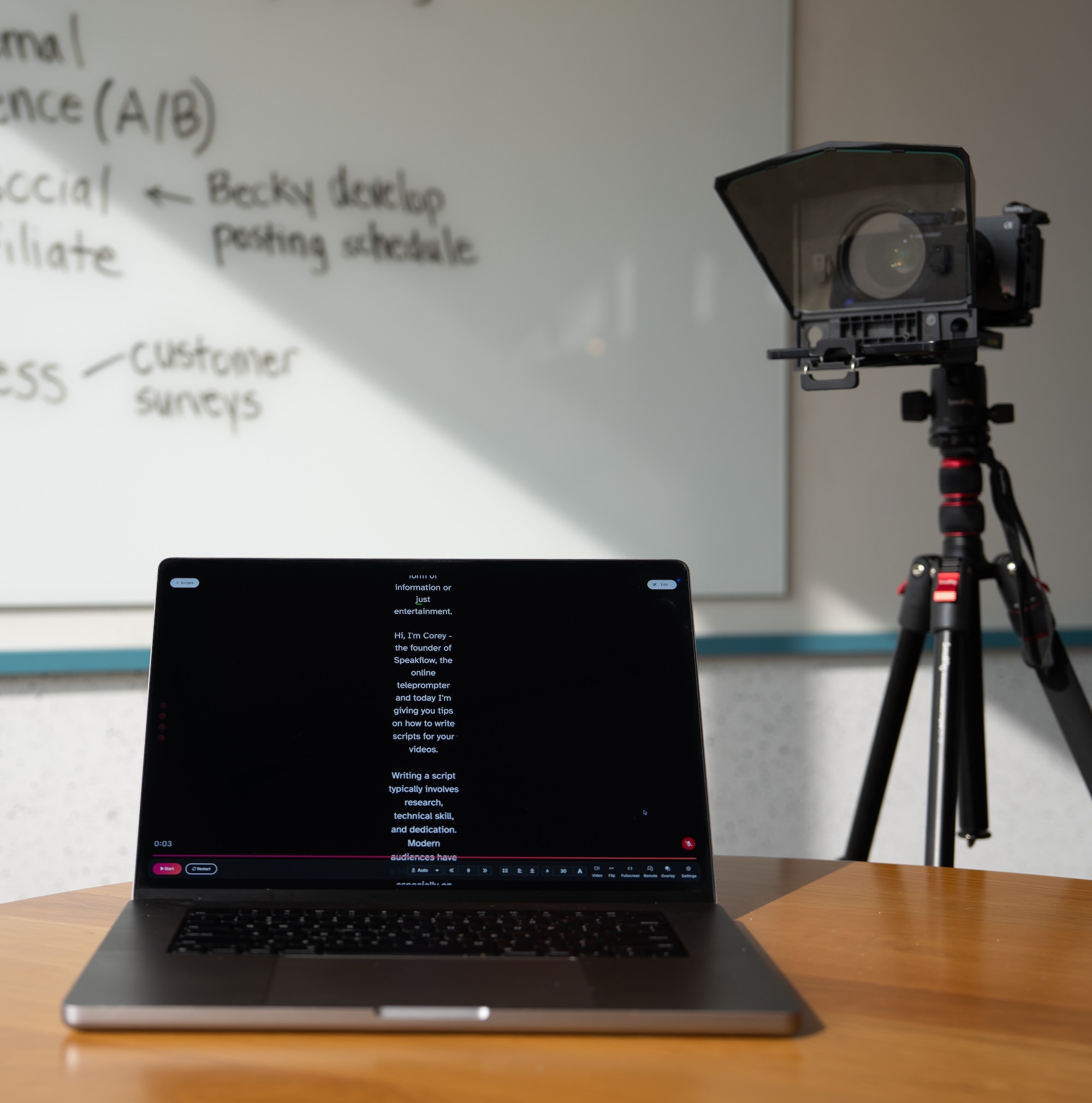 Person presenting to laptop